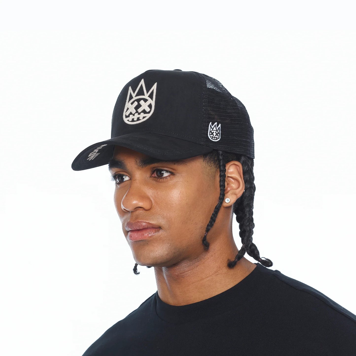 Ballers Clothing Shop black suede trucker hat with mesh back and raised chain-stitch Shimuchan logo on a model