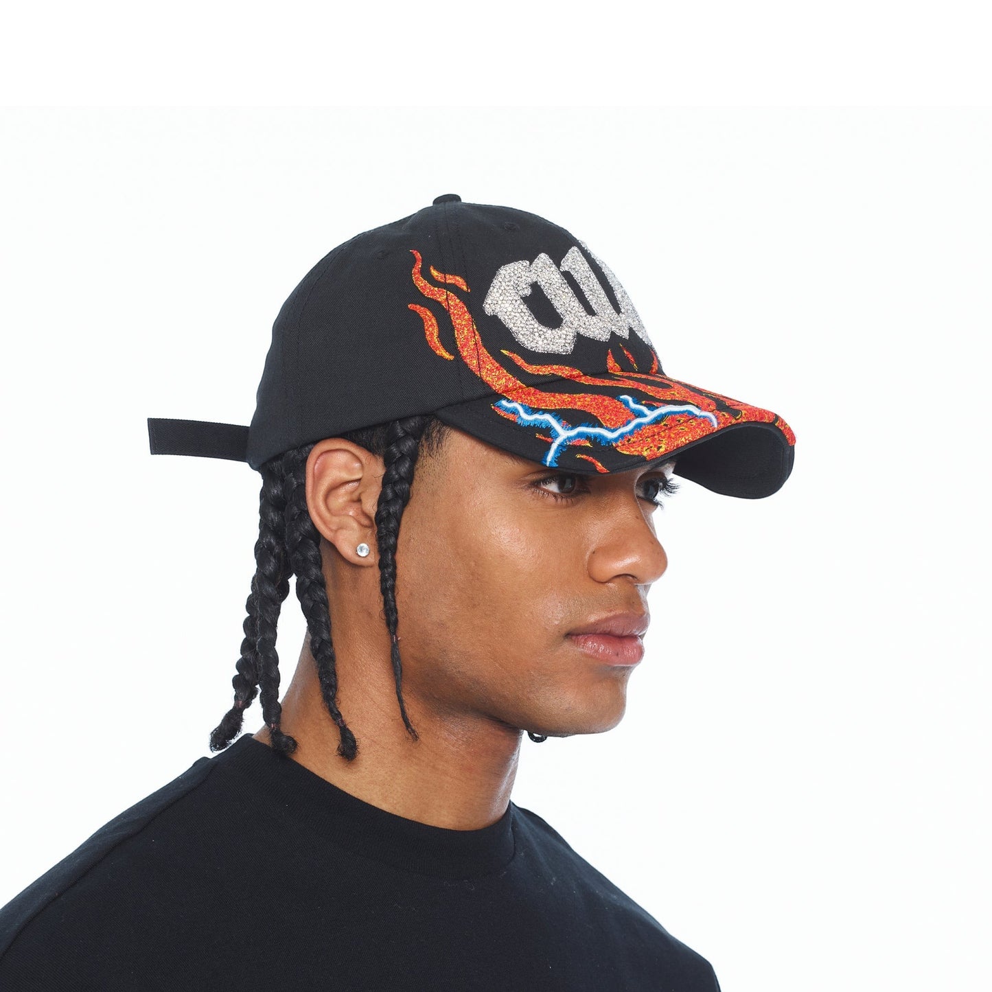 Ballers Clothing Shop black mesh back trucker hat with rhinestone flame design and logo on a model