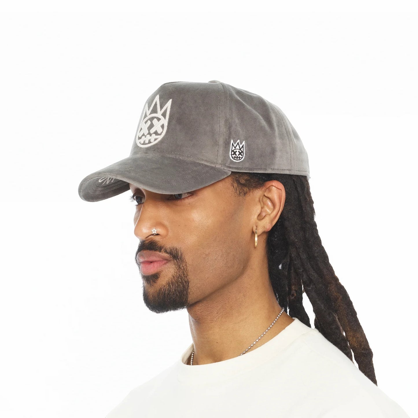 Ballers Clothing Shop grey velour A-frame trucker hat with white chain-stitch Shimuchan logo on a model