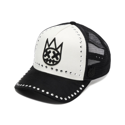 Ballers Clothing Shop black and white trucker hat with Shimuchan logo embroidery, silver stud accents, and mesh back.