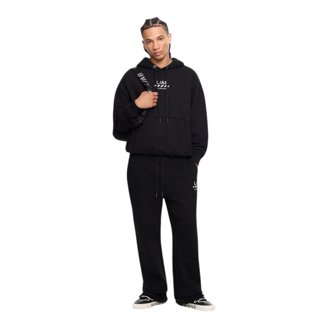 Ballers Clothing Shop model wearing a black L/AB c/o Off-White cotton hoodie with logo and kangaroo pocket