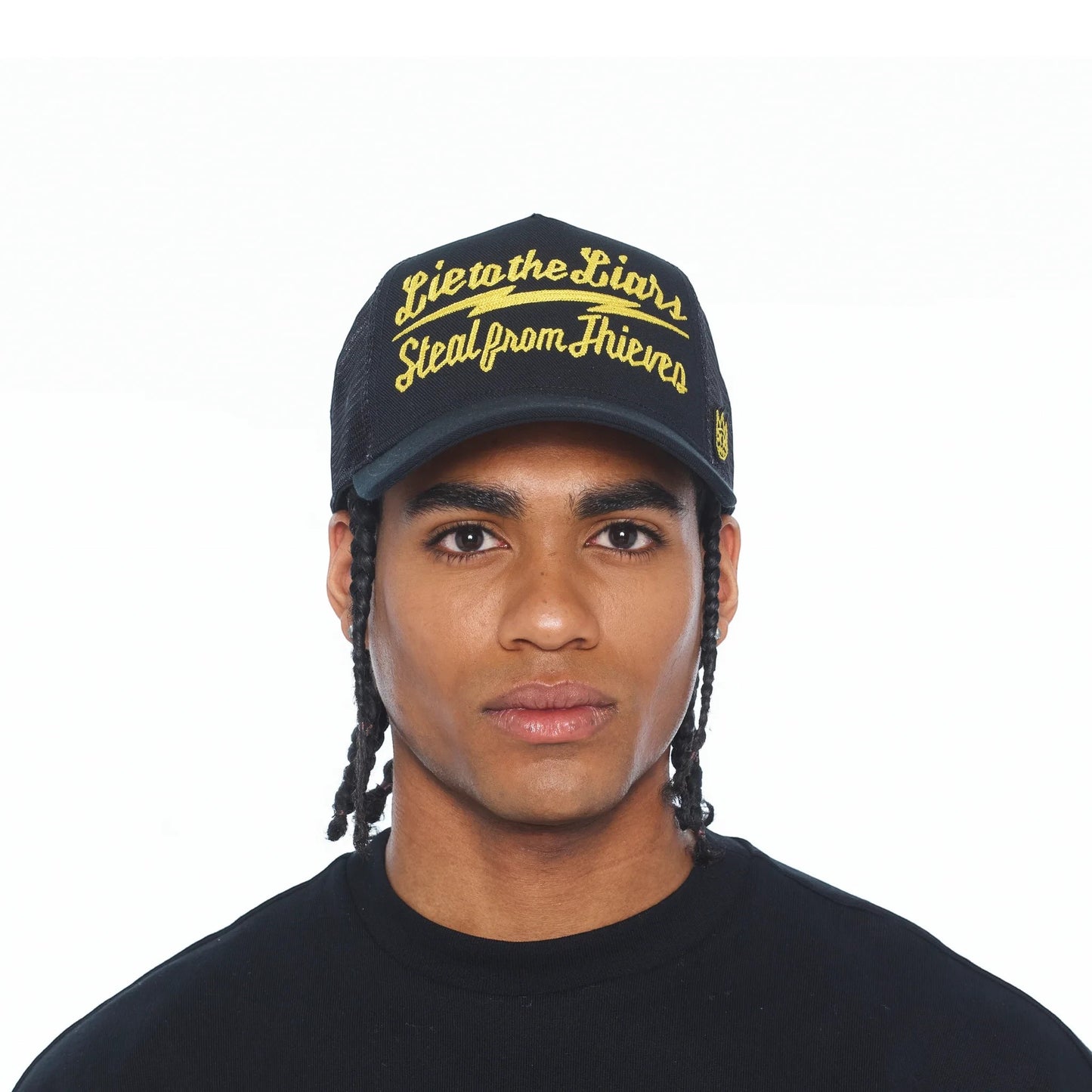 Ballers Clothing Shop black mesh back trucker hat with yellow embroidered Lie to the Liars text on the front