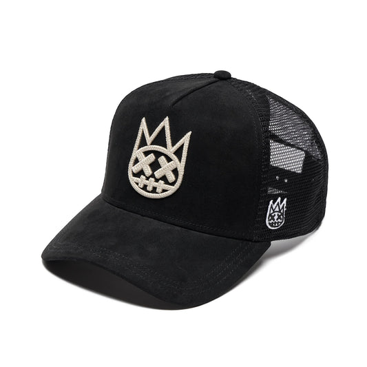 Ballers Clothing Shop black suede trucker hat with mesh back and raised white chain-stitch Shimuchan logo embroidery.