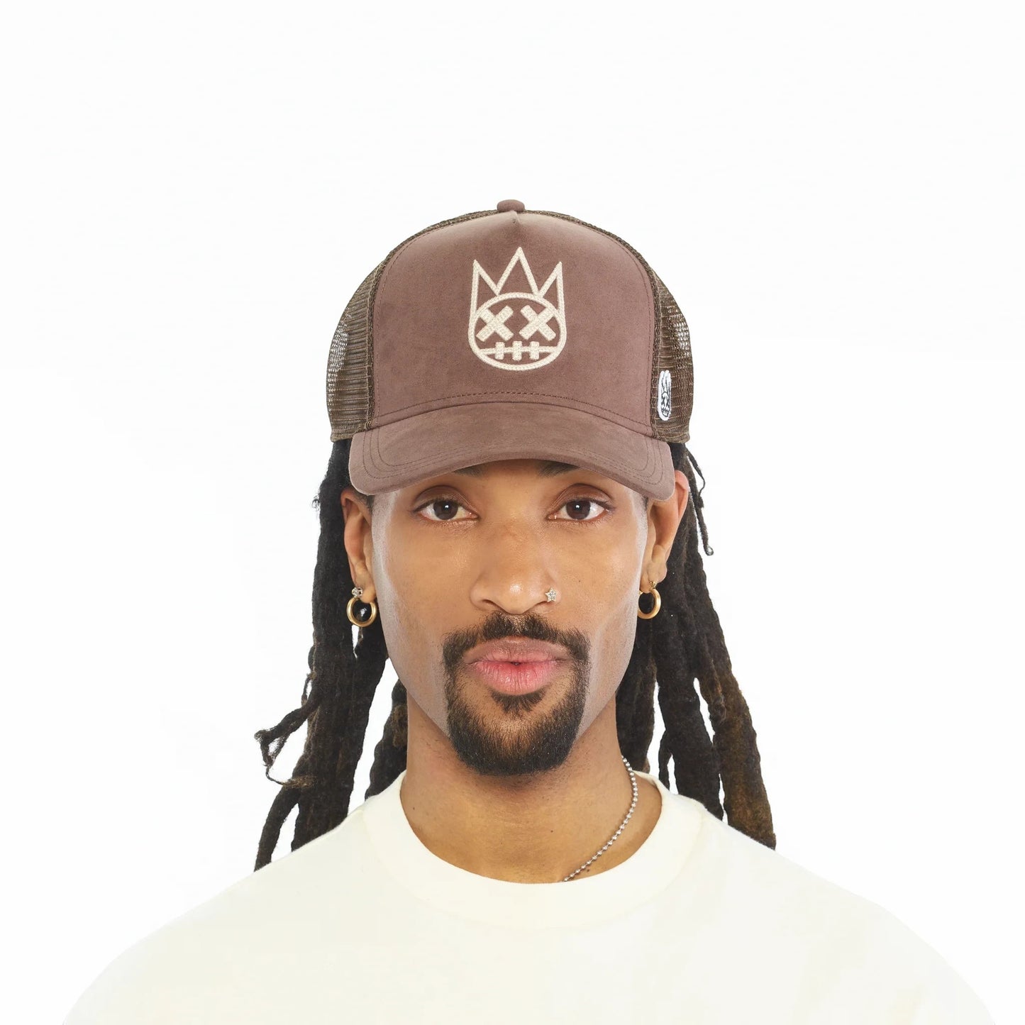 Ballers Clothing Shop pinecone brown suede trucker hat with mesh back and raised Shimuchan logo on a model