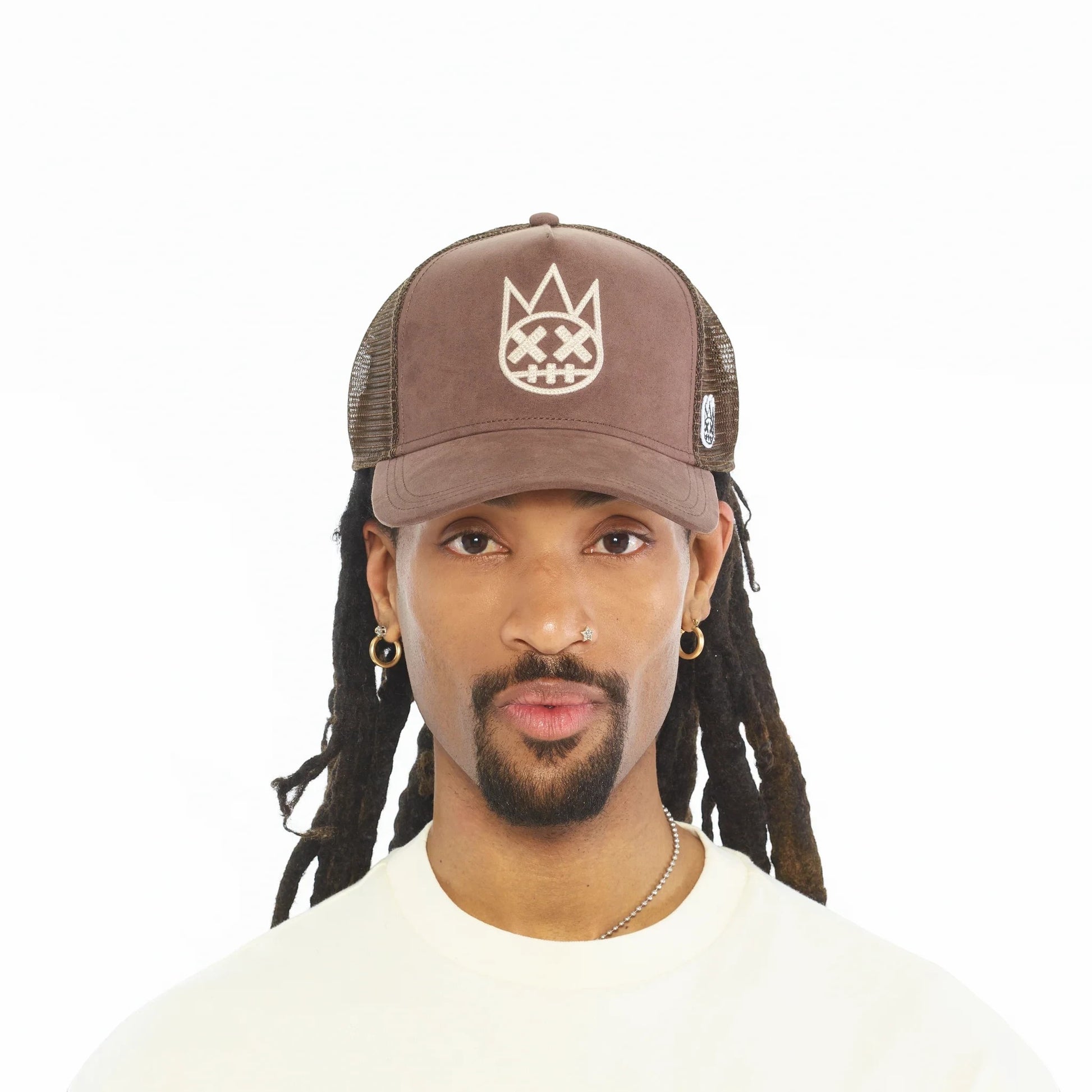 Ballers Clothing Shop pinecone brown suede trucker hat with mesh back and raised Shimuchan logo on a model