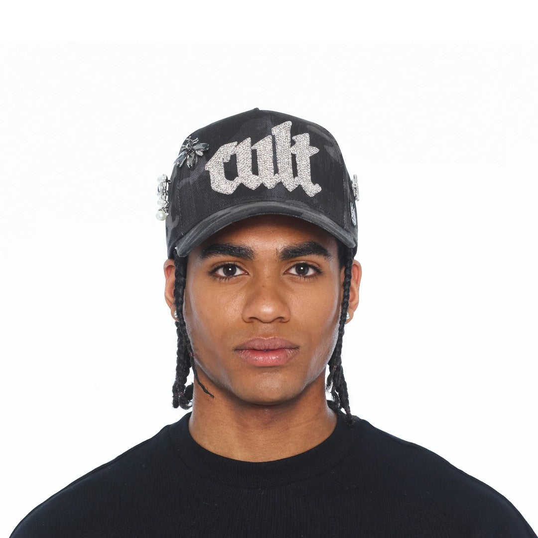 Ballers Clothing Shop black camo mesh trucker hat featuring a sparkling crystal Old English CULT logo