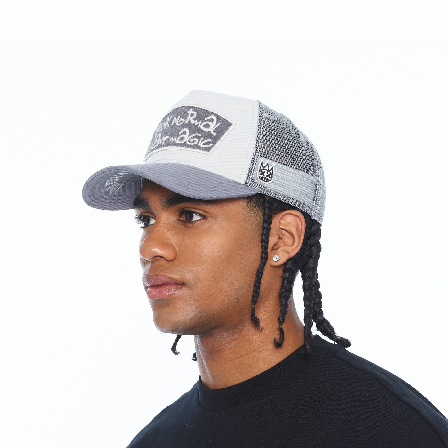Ballers Clothing Shop grey and white mesh back trucker hat with FXXK NORMAL I WANT MAGIC text on the front panel