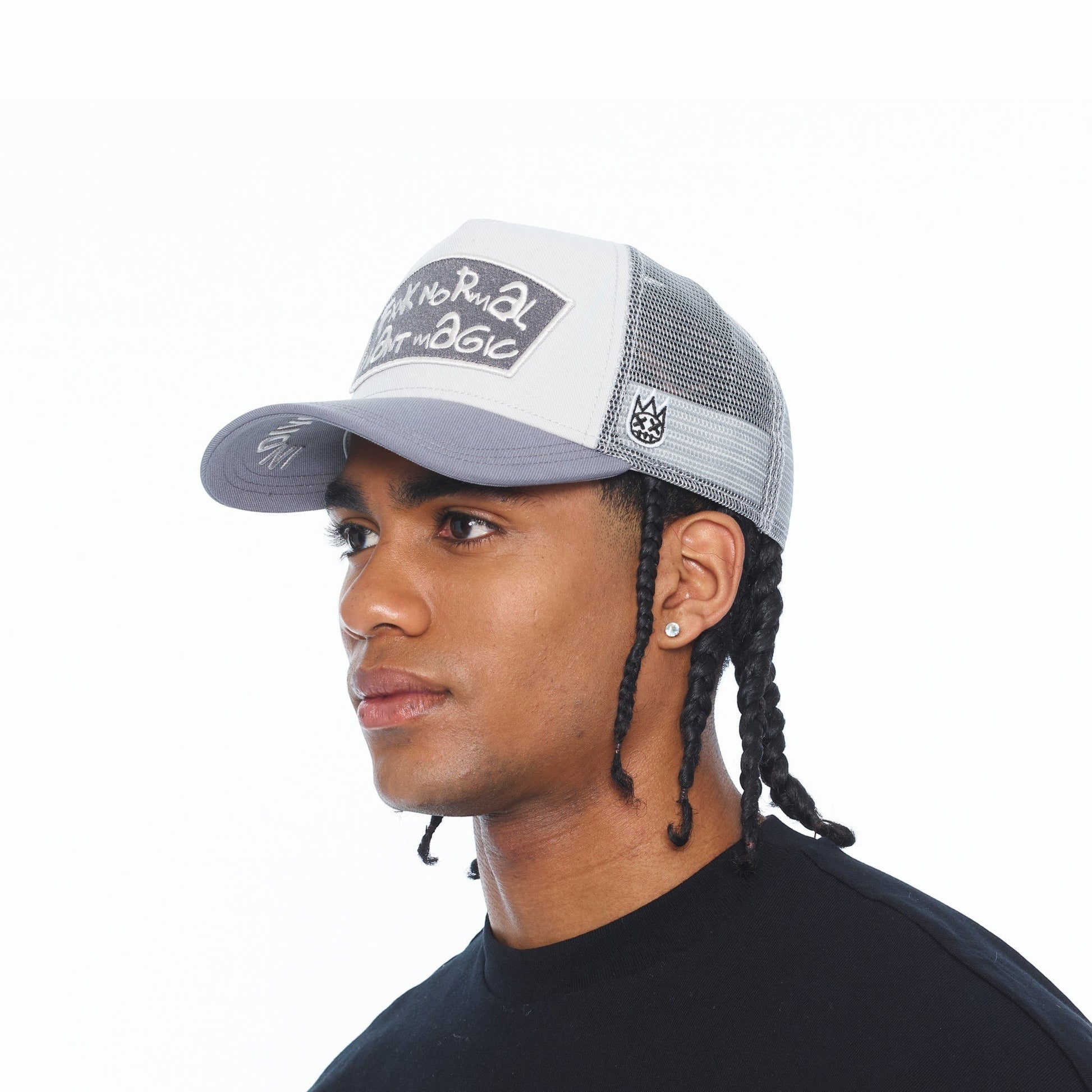 Ballers Clothing Shop grey and white mesh back trucker hat with FXXK NORMAL I WANT MAGIC text on the front panel