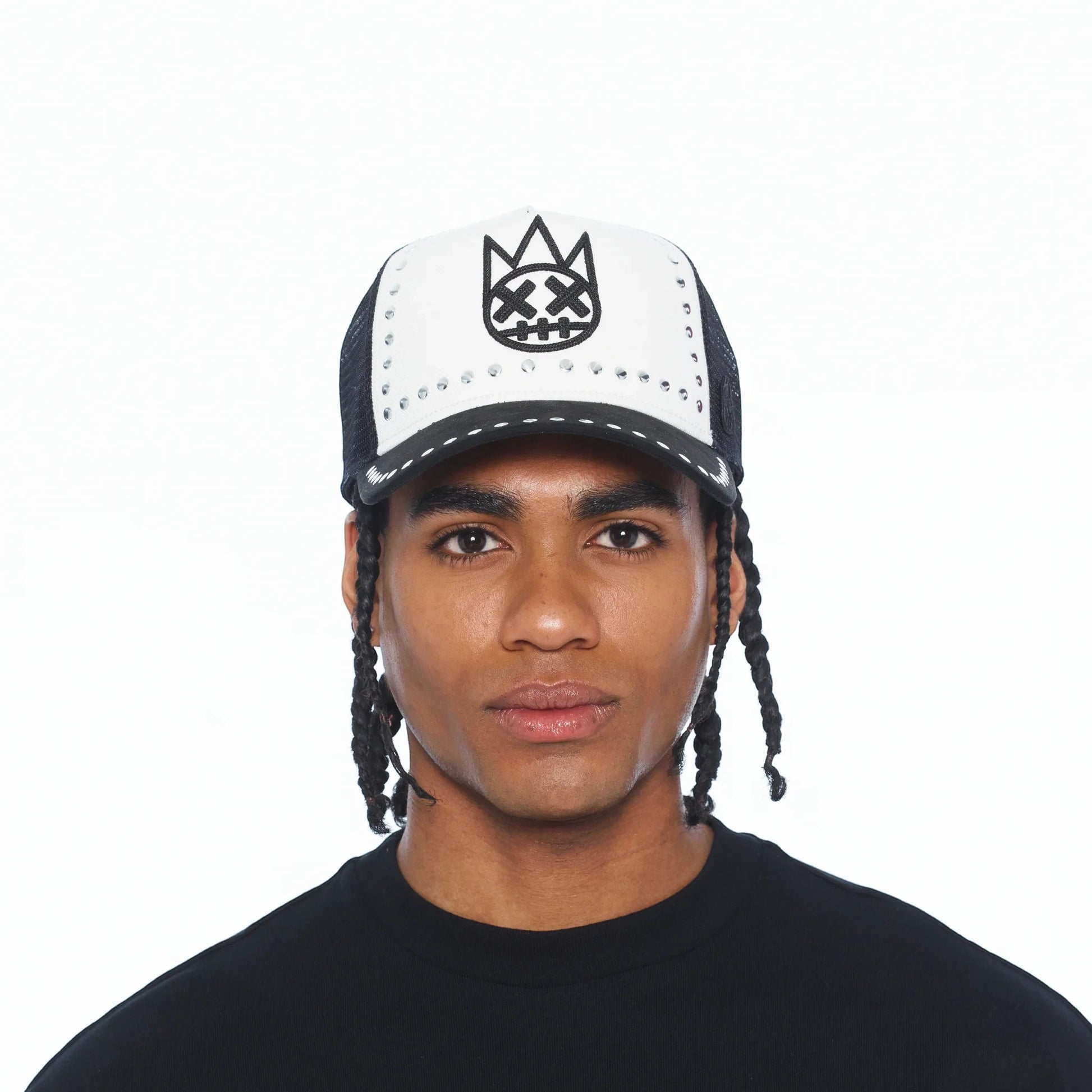 Ballers Clothing Shop black and white mesh trucker hat with Shimuchan logo embroidery and silver stud accents.