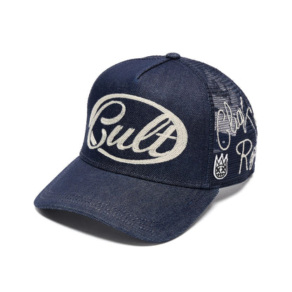 Ballers Clothing Shop navy denim trucker hat with white Cult embroidery and side graffiti-style graphic details.