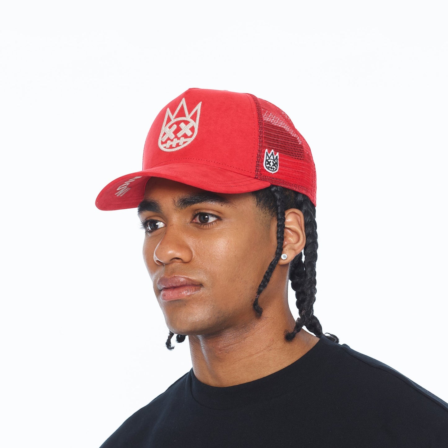 Ballers Clothing Shop racing red suede trucker hat with mesh back and raised chain-stitch logo worn by a model