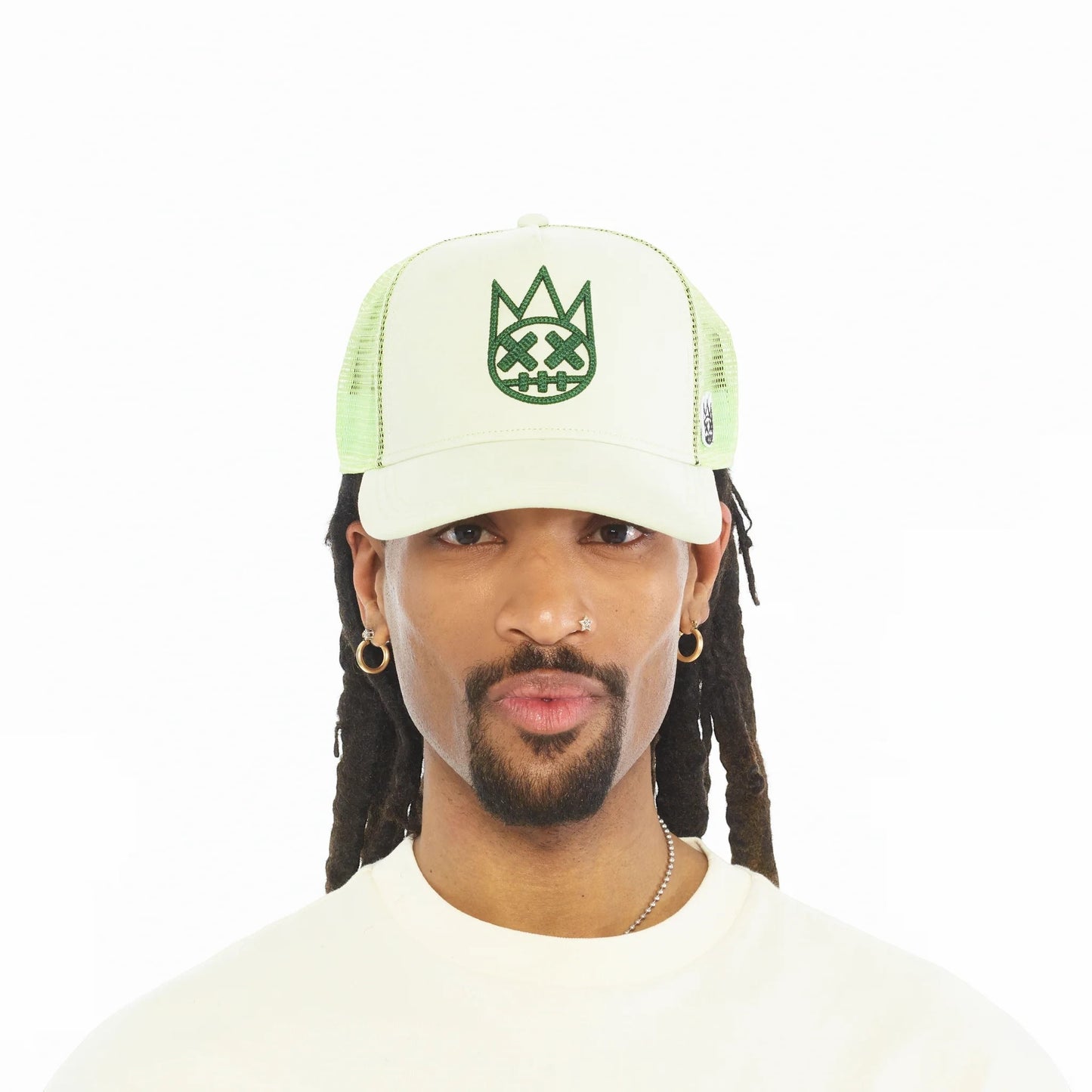 Ballers Clothing Shop seafoam green suede trucker hat with mesh back and raised green Shimuchan logo on a model