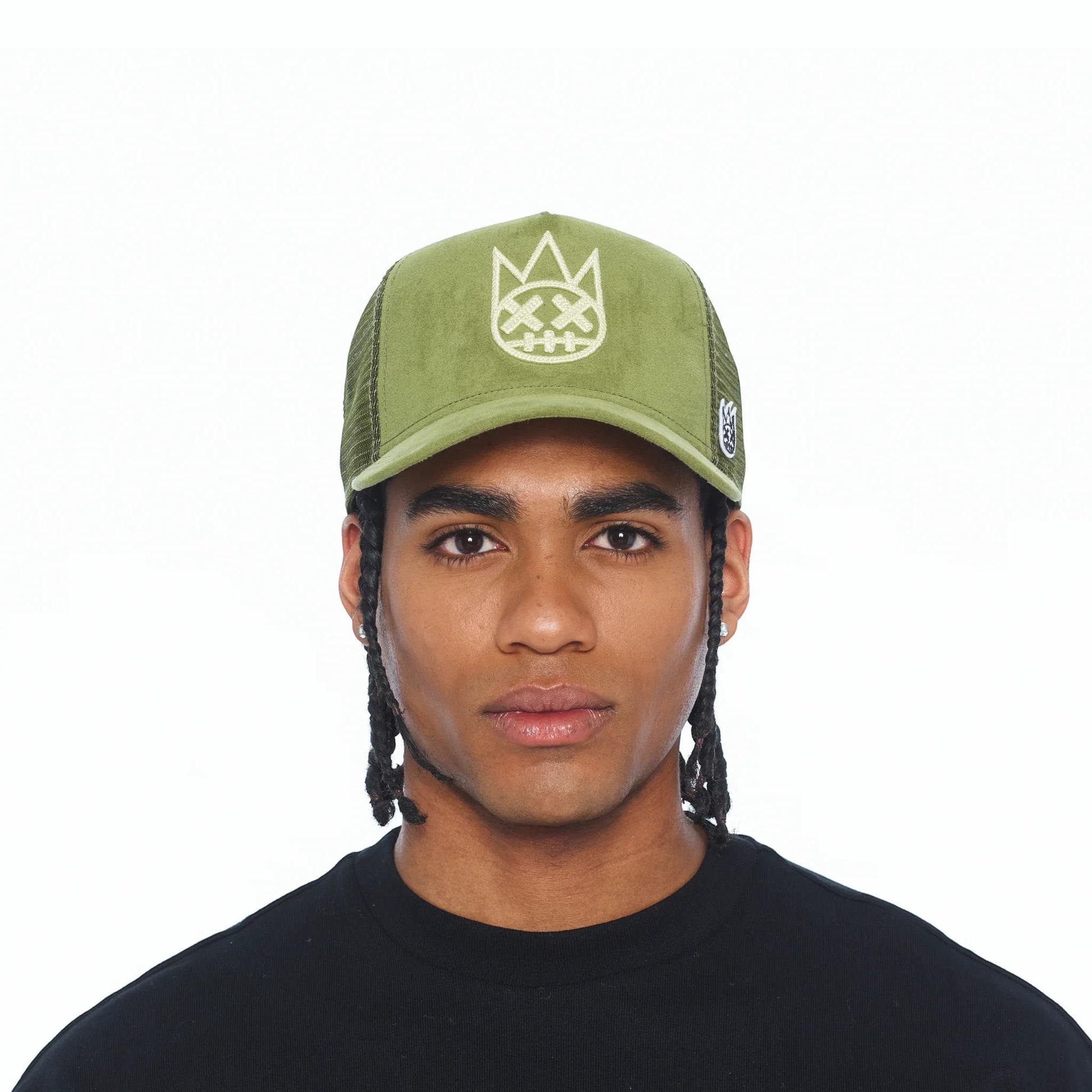 Ballers Clothing Shop sphagnum green suede trucker hat with mesh back and raised chain-stitch logo on a male model