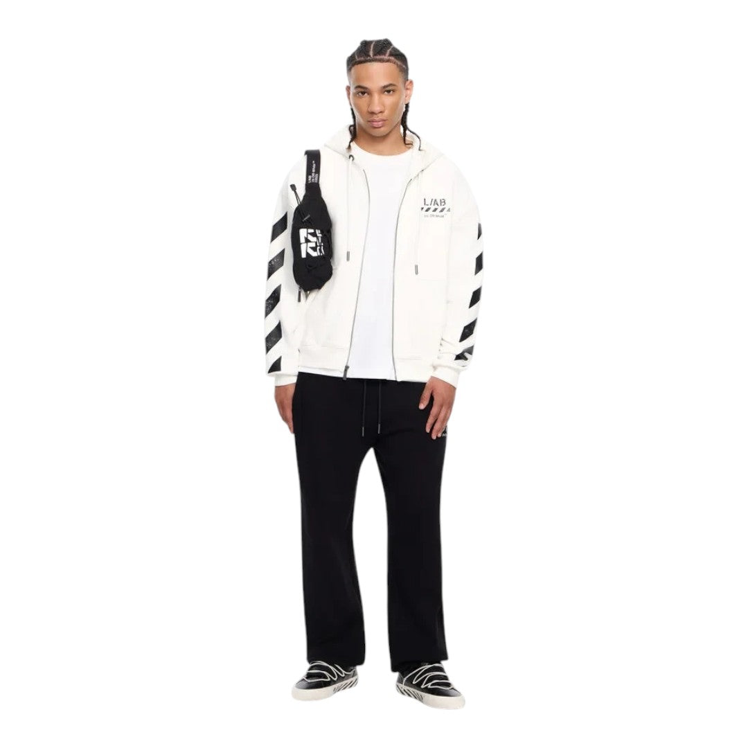 Model wearing Ballers Clothing Shop white L/AB c/o Off-White zip hoodie with black diagonal sleeve motifs and logo.